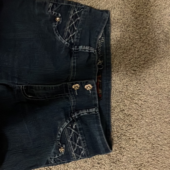 Two pairs of jeans.Both are brand new with no tags.Have cool designs aswell. - Picture 2 of 8